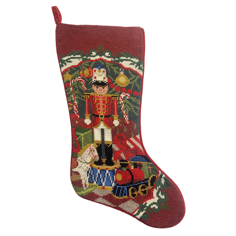Needlepoint Hand-Embroidered Wool Stocking Exquisite Home Designs nutcracker in red top white hat green background